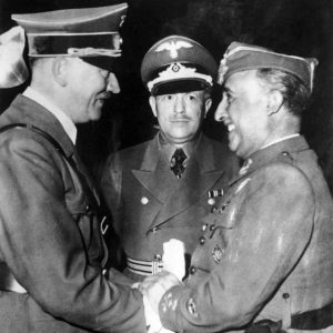 Here is Franco (the man with the cap on) looking very pleased and happy to be meeting with Hitler.