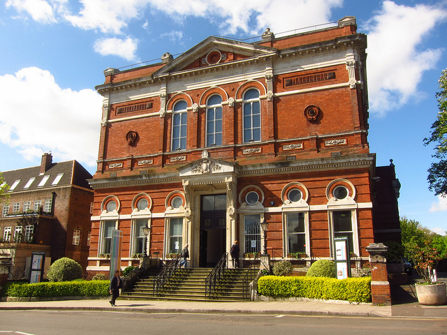 Image of the front of the Old Hampstead Town Hall, red brick with edwardian architectural features